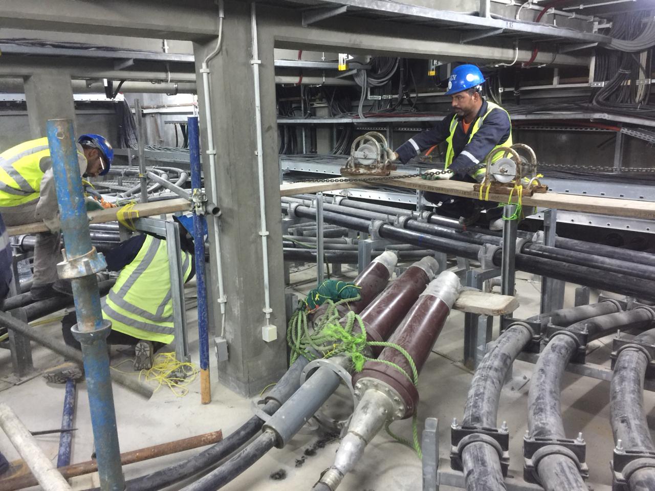 Technicians carrying out electrical cable works